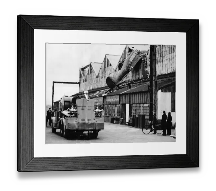 Framed Print : An RAF Avro Anson aircraft crashes into a hangar at Croydon Aerodrome 1949 Framed Print : An RAF Avro Anson aircraft crashes into a hangar at Croydon Aerodrome 1949