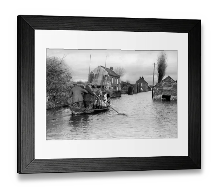 Framed Print : Flood in Athenley, Somerset, with a boat floating down main street, 1929 Framed Print : Flood in Athenley, Somerset, with a boat floating down main street, 1929