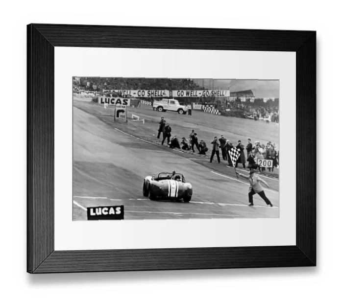 Framed Print : Jack Sears in his AC Cobra at Brands Hatch taking the winners flag 1964 Framed Print : Jack Sears in his AC Cobra at Brands Hatch taking the winners flag 1964