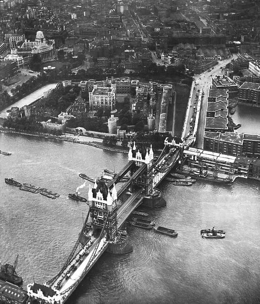 Aerial view of Tower Bridge and the Tower of London in 1931 R