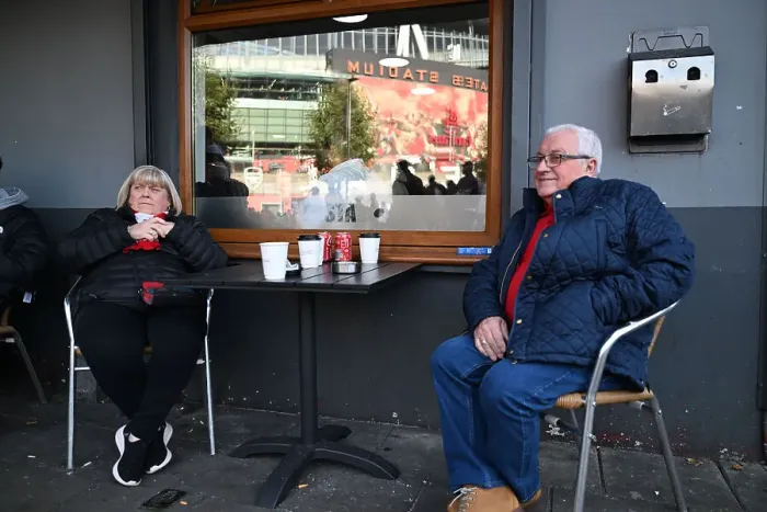 Framed Print : Arsenal fans outside the cafe outside the Emirates Framed Print : Arsenal fans outside the cafe outside the Emirates