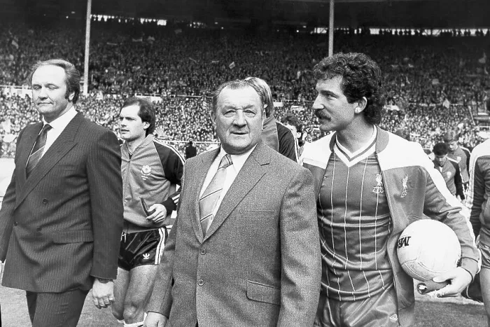 Framed Print : Bob Paisley leads the Liverpool squad on to the pitch at Wembley alongside Ron Atkinson, manager of Manchester United 1983 Framed Print : Bob Paisley leads the Liverpool squad on to the pitch at Wembley alongside Ron Atkinson, manager of Manchester United 1983