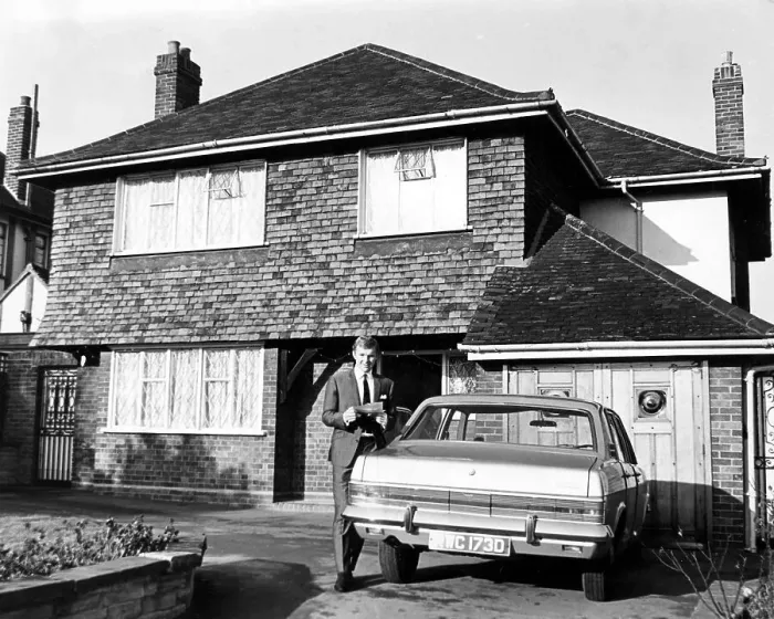Framed Print : Bobby Moore outside his home in Chigwell, Essex, with his Ford Zodiac (Mk4) car Framed Print : Bobby Moore outside his home in Chigwell, Essex, with his Ford Zodiac (Mk4) car