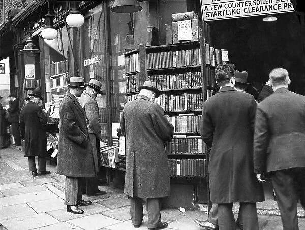 Bookshop browsers. Shoppers peruse the shelves outside a bookshop in Charing Cross Road
