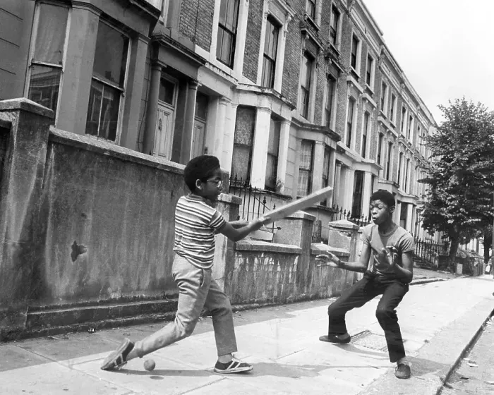 Framed Print : Boys playing cricket in the street 1973 Framed Print : Boys playing cricket in the street 1973
