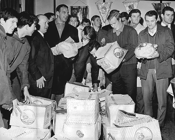 Cardiff City FC players receiving their Christmas turkeys 1964