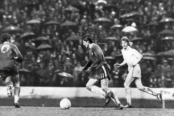 Chelsea's Charlie Cooke (centre), is too fast for Gordon McQueen (R) of Leeds