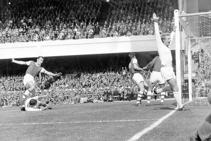 Framed Print : David Herd scores with a header for United. Denis Law celebrates Arsenal v Manchester United 1962 Framed Print : David Herd scores with a header for United. Denis Law celebrates Arsenal v Manchester United 1962