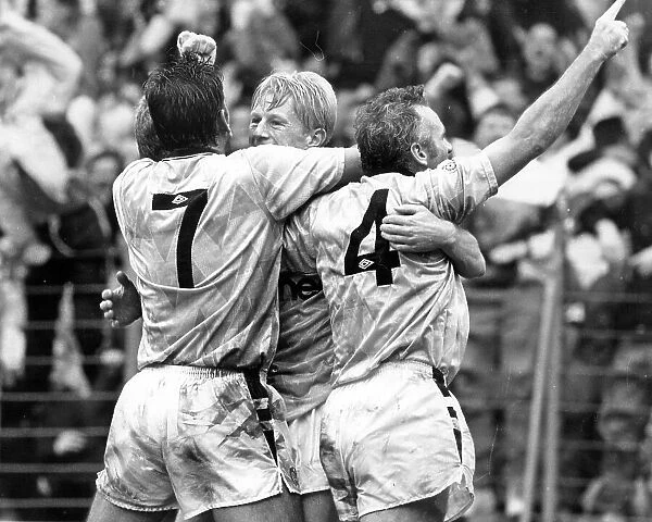 David White (Left) and Peter Reid (Right) with Colin Hendry after he scored Manchester City's third goal