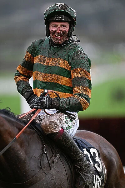 Declan Lavery, who rode A Wave Of The Sea in the Amateur Jockeys Handicap Chase, was left covered in mud after the race Cheltenham Festival week