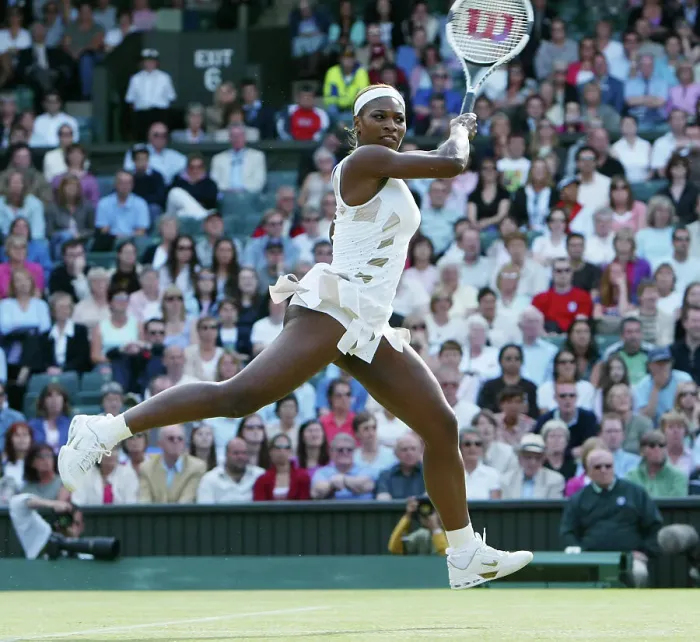 Framed Print : Defending champion Serena Williams in the semi-final of the Ladies Singles tournament of The Lawn Tennis Championships at Wimbledon 2004 Framed Print : Defending champion Serena Williams in the semi-final of the Ladies Singles tournament of The Lawn Tennis Championships at Wimbledon 2004