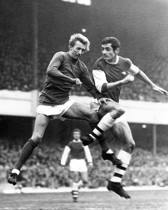 Framed Print : Denis Law (left) of Manchester United, in action against Frank McLintock of Arsenal Framed Print : Denis Law (left) of Manchester United, in action against Frank McLintock of Arsenal