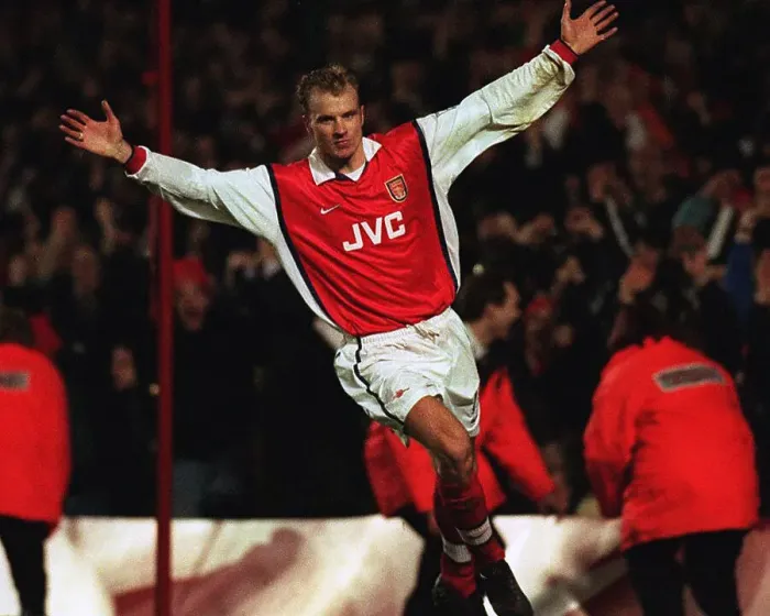 Framed Print : Dennis Bergkamp celebrates scoring for Arsenal Framed Print : Dennis Bergkamp celebrates scoring for Arsenal