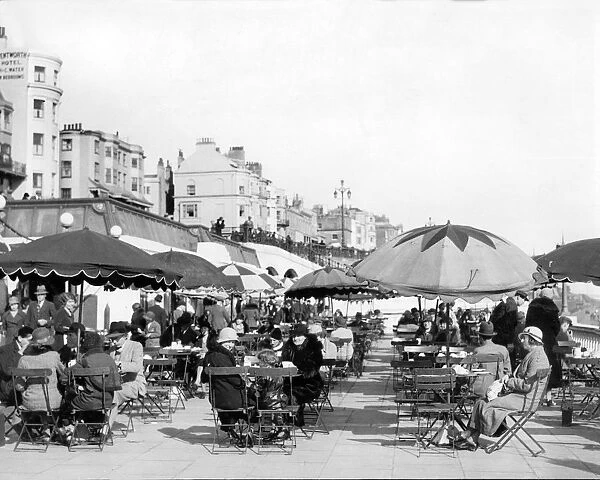 Diners take tea outdoors at Brighton during Easter sunshine, 1933