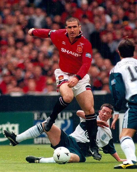Eric Cantona in action for Man United