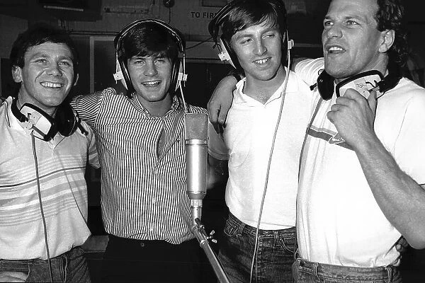 Everton footballers (L-R) Peter Reid, Graeme Sharp, Gary Stevens and Andy Gray, recording Everton football team's FA Cup Final song at Abbey Road