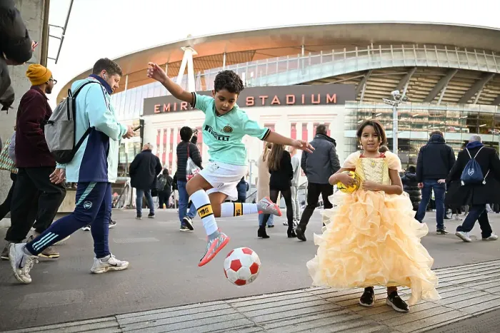 Framed Print : Fans outside Emirates Stadium Framed Print : Fans outside Emirates Stadium