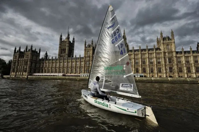 Framed Print : Finn class dinghy on the Thames by the Houses of Parliament