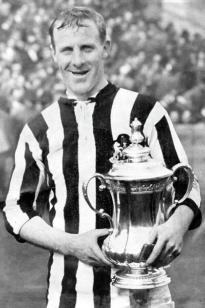 Frank Hudspeth captain of Newcastle United holding the F.A. cup