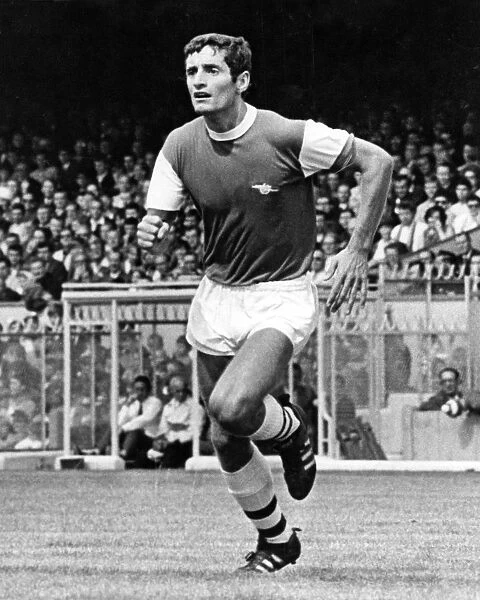 Frank McLintock in action for Arsenal