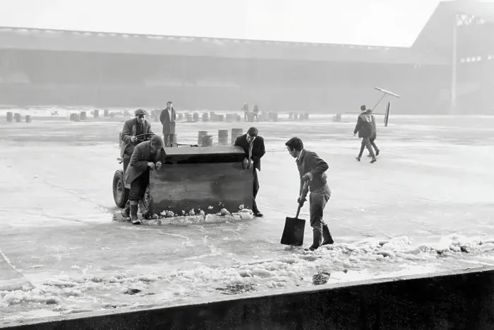 Framed Print : Groundsmen attempting to rid the pitch of ice at Anfield, during the bad winter of 1962 / 1963 Framed Print : Groundsmen attempting to rid the pitch of ice at Anfield, during the bad winter of 1962 / 1963
