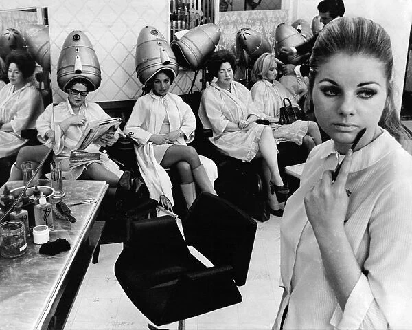 Hair Salon. Raymonds Knightsbridge salon, stylist Juliet Rothe with empty seat 1968