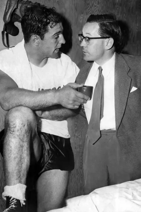 Framed Print : Harry Carpenter, journalist, with boxer Rocky Marciano at his training quarters Framed Print : Harry Carpenter, journalist, with boxer Rocky Marciano at his training quarters