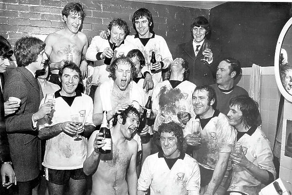 Hereford players celebrate in the dressing room after beating Newcastle