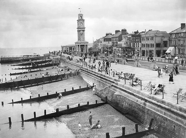 Herne Bay, 1935. Aerial View of seafront and old clock tower at Herne Bay in Kent, 1935