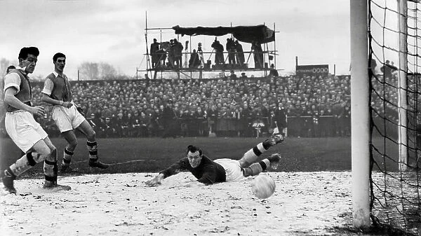 Jack Kelsey sprawled in the sawdust watches the ball enter the net for Bedford's only goal scored by Harry Yates, behind Charlton on the left