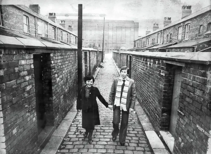 Framed Print : Kazimierz Deyna Polish footballer with his wife Mariola, on a street in front of Manchester City Football Ground, Maine Road 1978 Framed Print : Kazimierz Deyna Polish footballer with his wife Mariola, on a street in front of Manchester City Football Ground, Maine Road 1978