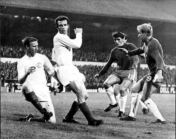 Leeds United footballer Paul Reaney (2nd left) with Jack Charlton (left) Charlie Cooke (right)