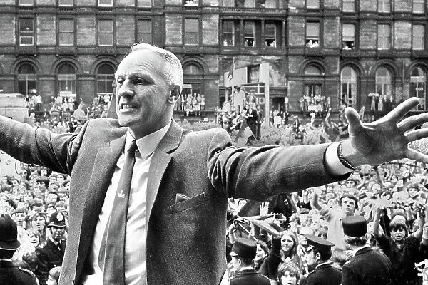 Liverpool manager Bill Shankly comes home to cheers from the crowd despite losing to Arsenal in the 1971 F. A. Cup Final