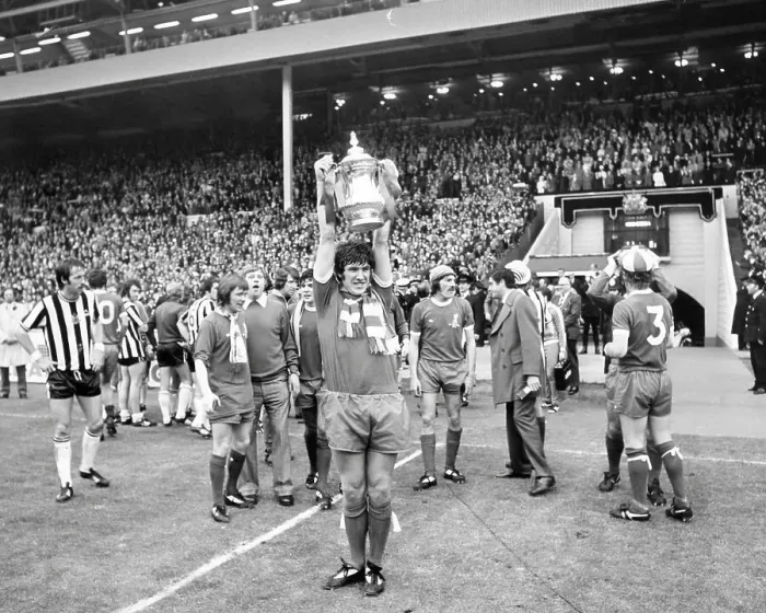 Framed Print : Liverpool v Newcastle United 1974 FA Cup Final at Wembley Stadium. Emlyn Hughes with the Cup for Liverpool Framed Print : Liverpool v Newcastle United 1974 FA Cup Final at Wembley Stadium. Emlyn Hughes with the Cup for Liverpool