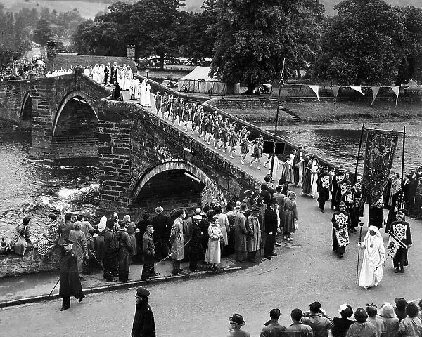 Llanwrst, Wales, Bardic procession crossing the bridge after the Gorsedd ceremony at the Eisteddfod
