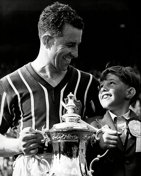 Manchester City Footballer Roy Paul after FA cup final with his son Robert 1956