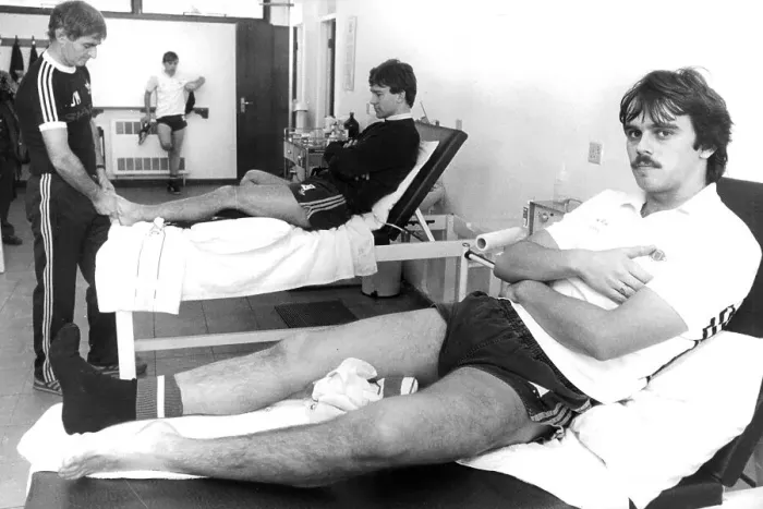 Framed Print : Manchester United F. C. footballers Alan Davies (front) and Bryan Robson having treatment Framed Print : Manchester United F. C. footballers Alan Davies (front) and Bryan Robson having treatment