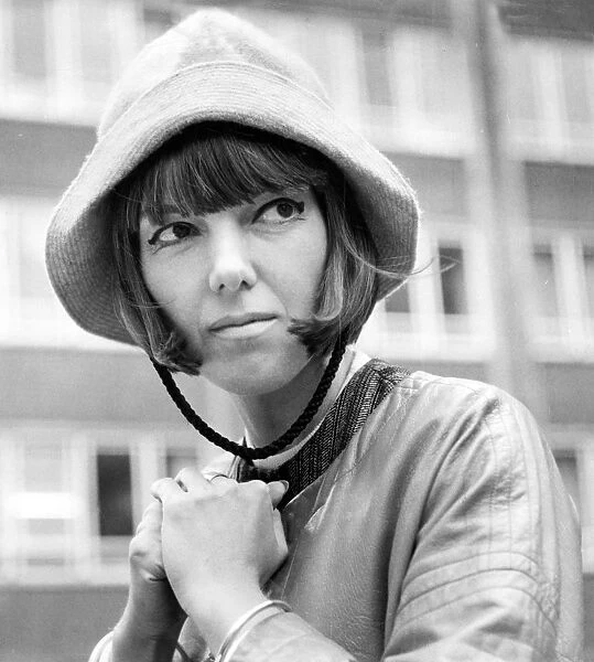 Mary Quant in 1962. Fashion designer Mary Quant wearing a sou wester in 1962