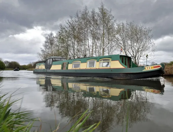 Framed Print : Narrowboats pass along the Bridgewater Canal Framed Print : Narrowboats pass along the Bridgewater Canal