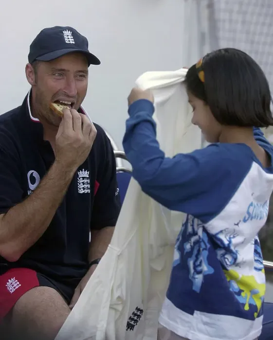 Framed Print : Nasser Hussain gives his shirt to a local girl after the game