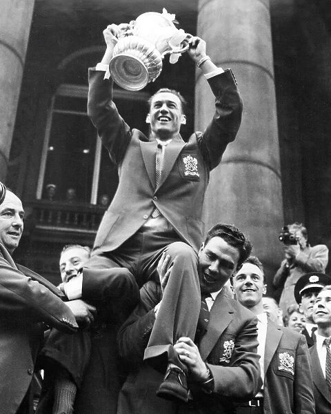 Nat Lofthouse holds aloft the FA Cup after Boltons triumph in 1958