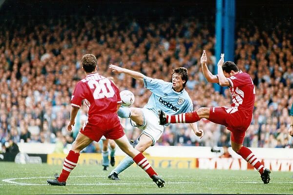 Niall Quinn (c) in play during Manchester City v Liverpool