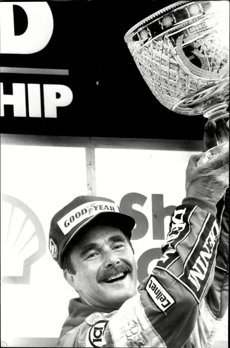 Framed Print : Nigel Mansell holds the trophy after winning the British Grand Prix at Silverstone Framed Print : Nigel Mansell holds the trophy after winning the British Grand Prix at Silverstone