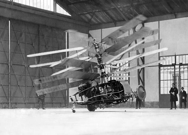 The Pescara helicopter making an experimental flight in a hangar