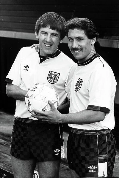 Peter Beardsley and Kenny Samson show off the new England football strip 1987