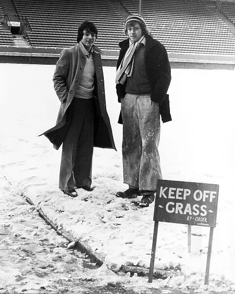 Peter Marinello, Arsenal footballer, with groundsman Bob Hall on pitch covered in snow, Craven Cottage, 1979