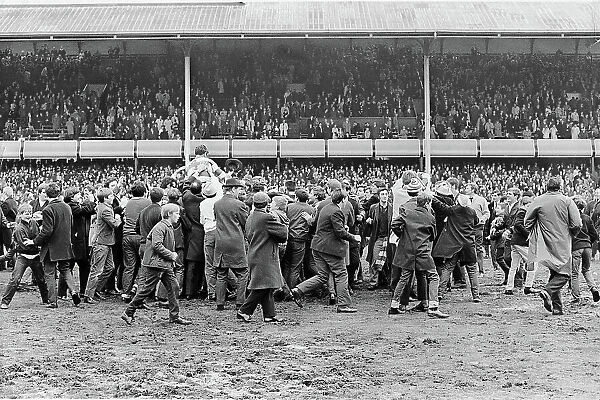 QPR fans celebrate with their team after winning promotion to Division One 1968