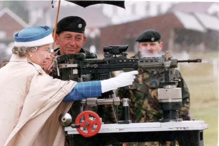 Framed Print : The Queen with a gun Framed Print : The Queen with a gun