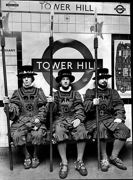 Student Beefeaters on the Underground at Tower Hill station. The
