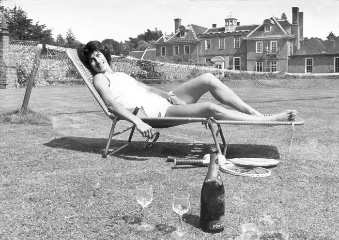 Framed Print : Tennis Player Virginia Wade relaxing in the sun at home in Kent after her Wimbledon win 1977 Framed Print : Tennis Player Virginia Wade relaxing in the sun at home in Kent after her Wimbledon win 1977
